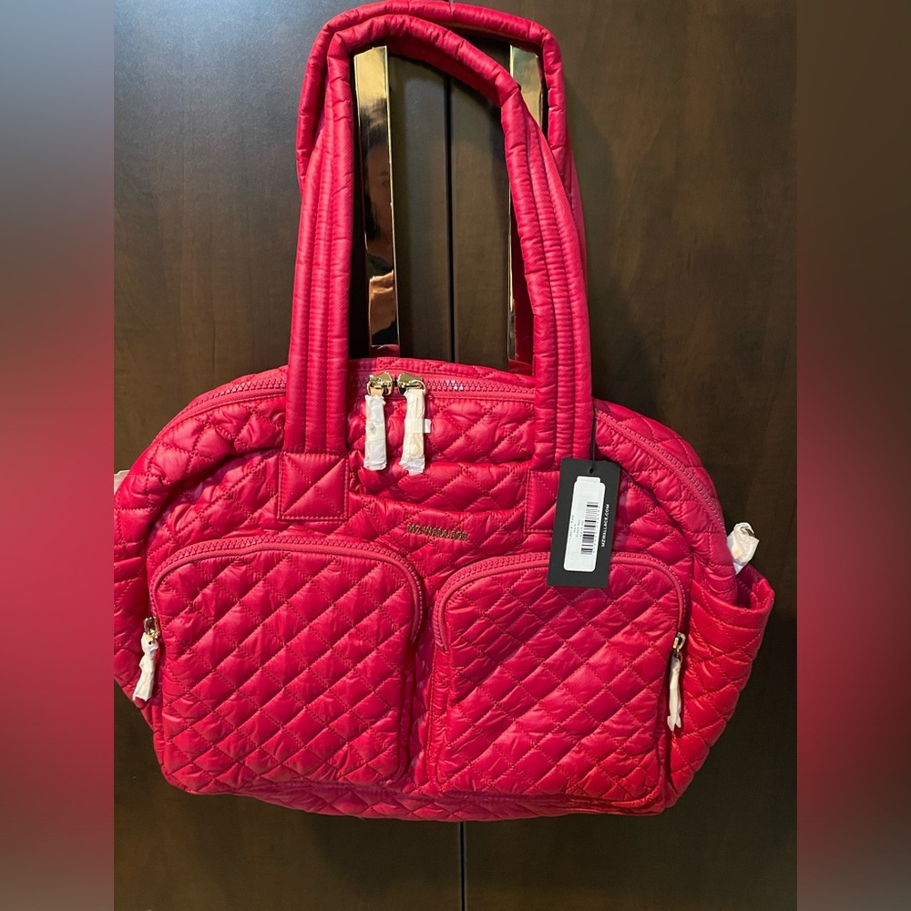Brand new with tags MZ Wallace Nik travel tote in punch pink.